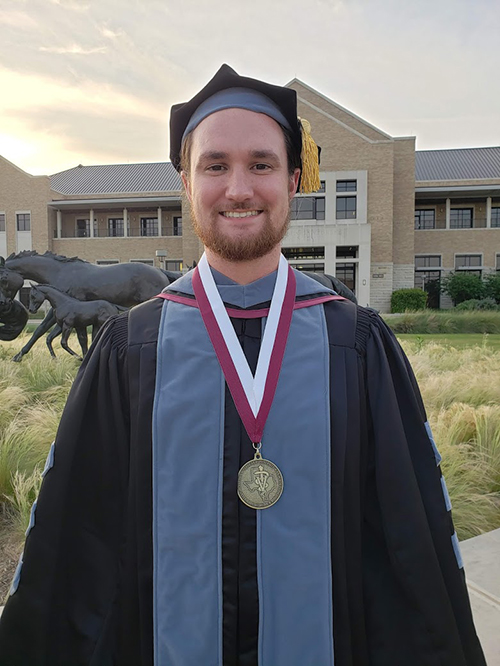 Austin Floyd in graduation regalia