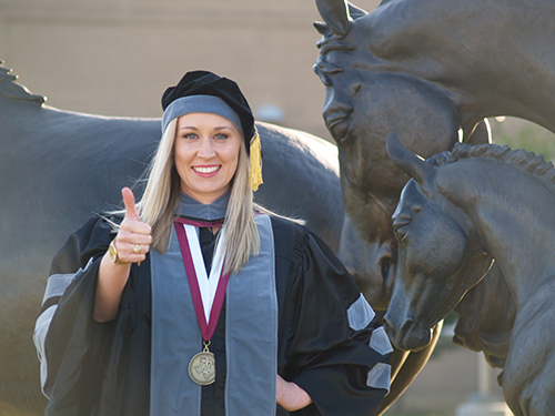 Ashtyn Marek in graduation regalia