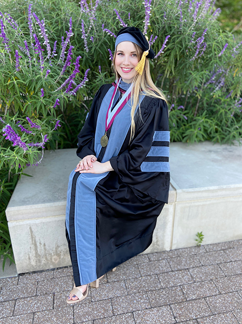 Ashley Polasek in graduation regalia