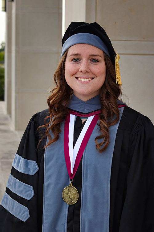 Desiree Davidson in graduation regalia