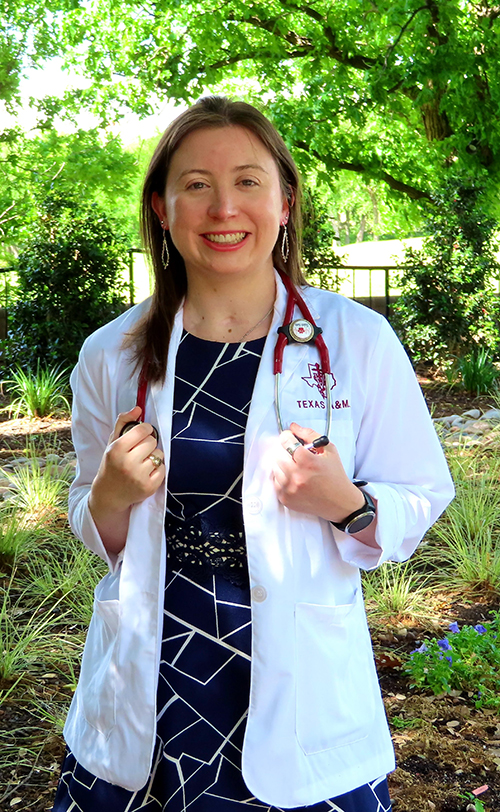 Elizabeth Martin in a white coat