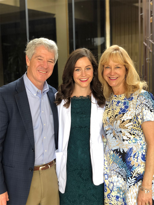 Erika Wiggs with her parents