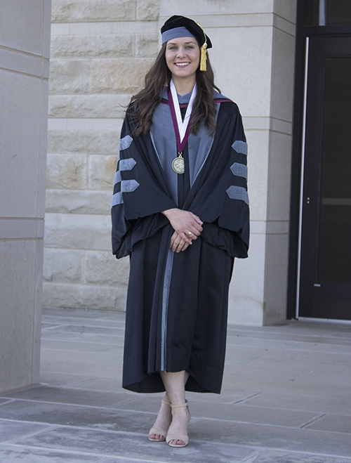 Hunter Greer in graduation regalia