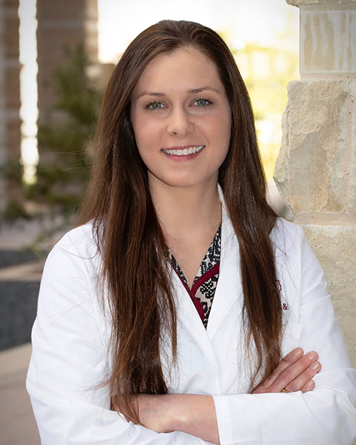 Hunter Greer in white coat