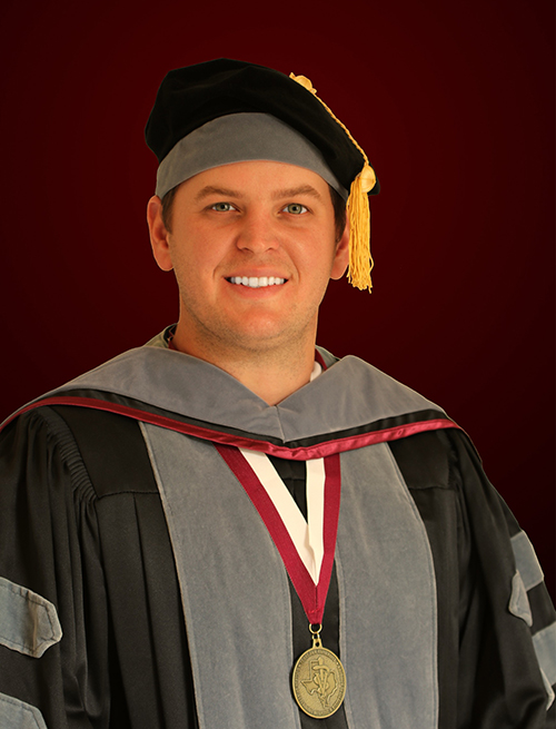 Joseph Blount in graduation regalia