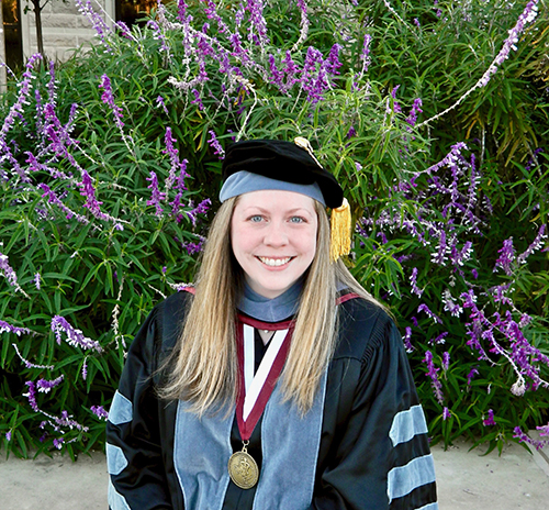 Jill Starks in graduation regalia