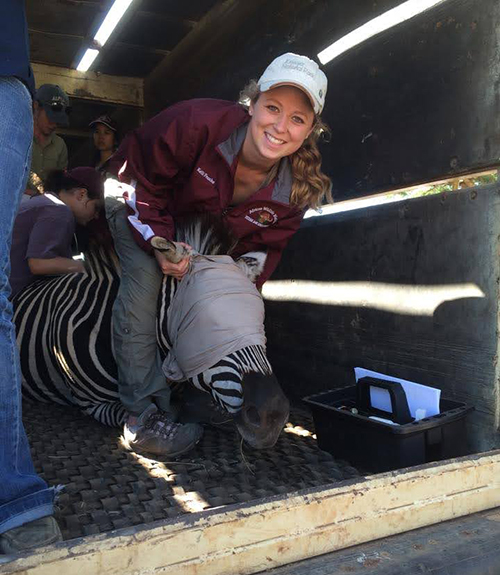 Kelli Franks with a zebra