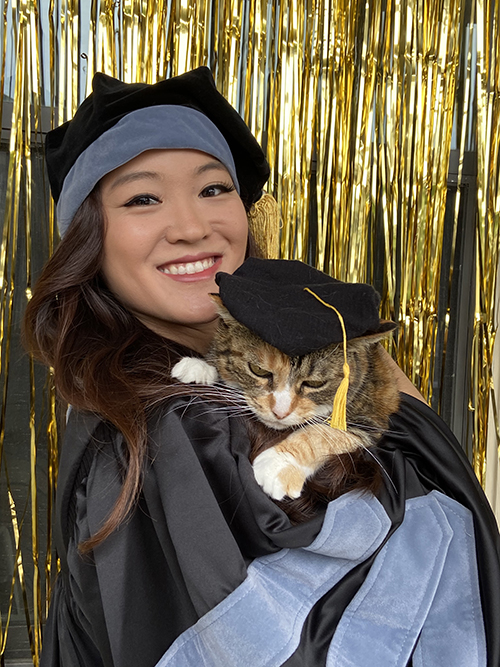 Katrina Luu with a cat