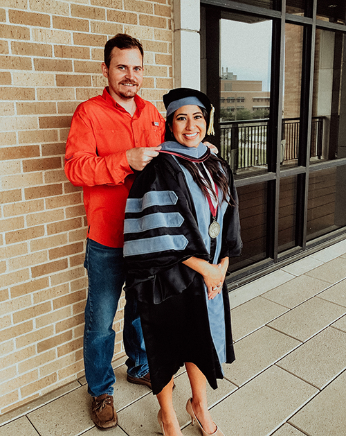 Lauren Balderas Lyda in graduation regalia