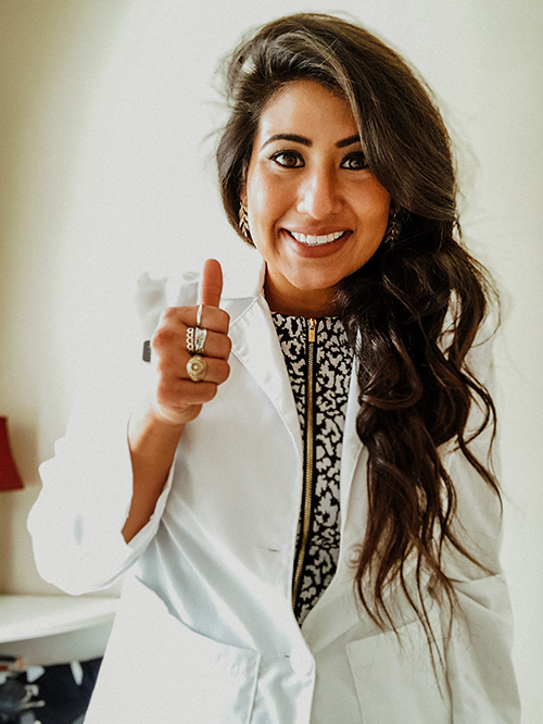 Lauren Balderas Lyda in white coat