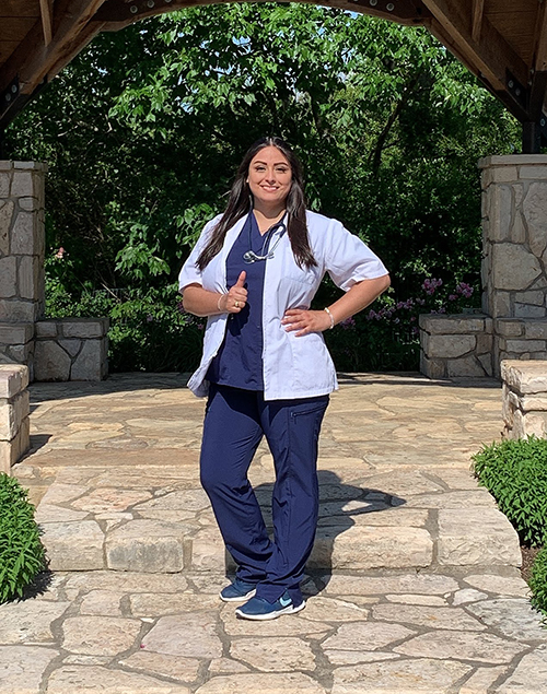 Meagan Gonzalez in white coat