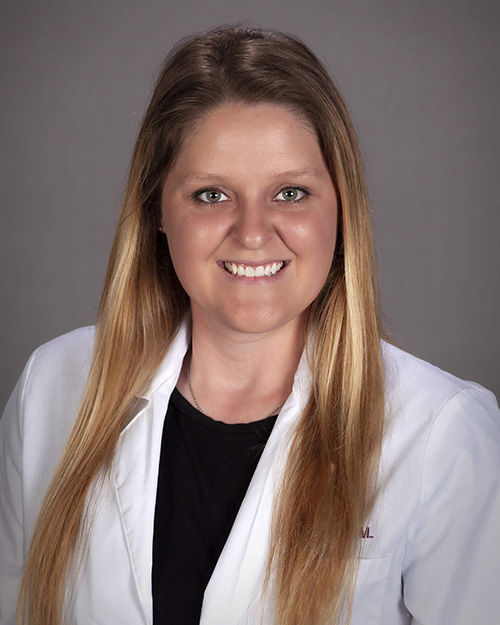 Miranda Lester in white coat