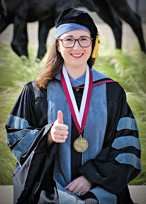 Sarah Genz in graduation regalia