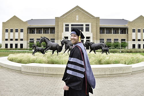 Nathan Wheeless in graduation regalia