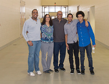 Drs. Johnson and Manley with their sons, Xavier (left), Elias, and Isaiah (right)