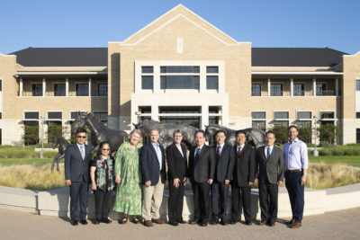 Group photo of NCHU delegation and CVM faculty in front of College of Veterinary Medicine
