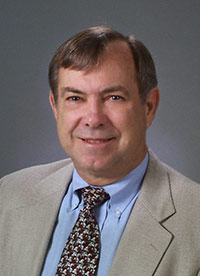 Dr. James E. Womack