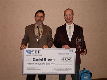 Daniel Brown with award