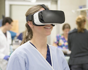 A student wearing the virtual reality headset