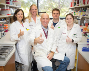 Dr. Noah Cohen (center) and staff