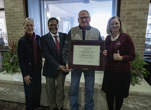 Dean Eleanor M. Green, Dr. Ramesh Vemulapalli, Dr. James Derr, and Kathryn Greenwade with the award certificate