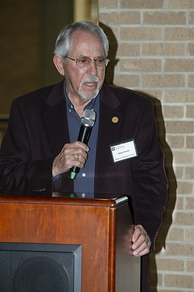 Dr. Sonny Presnal speaks after receiving his award
