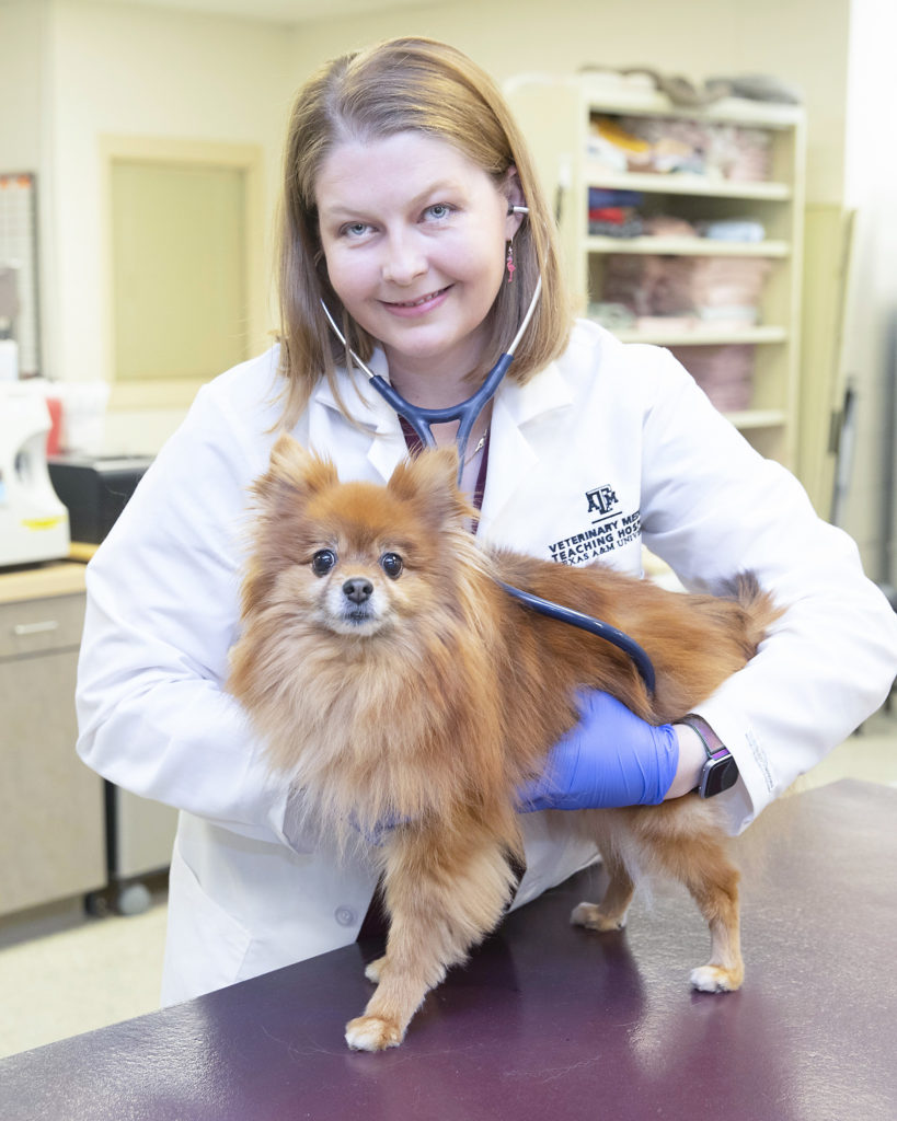 Dr. Christine Rutter and a dog