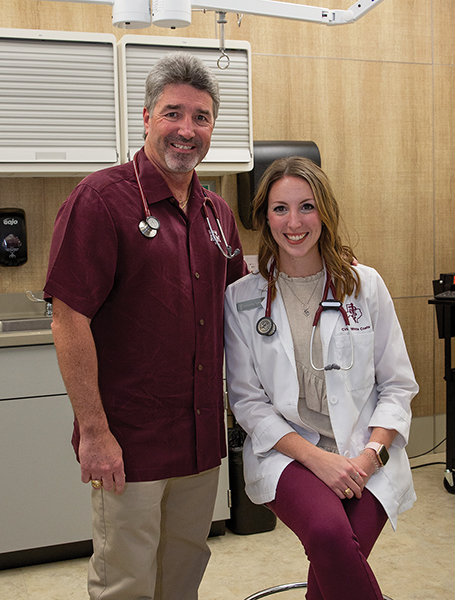 Dr. George and Amanda Tabone in a veterinary clinic