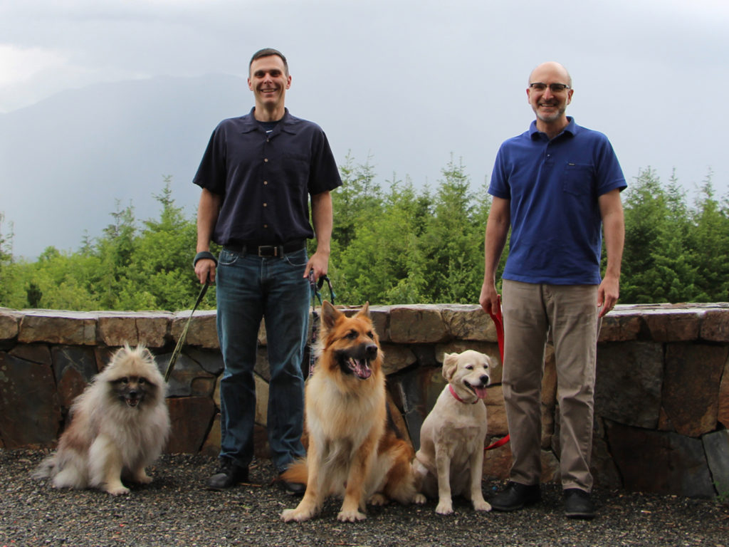 Dog Aging Project co-founders Kaeberlein and Promislow with their 3 dogs