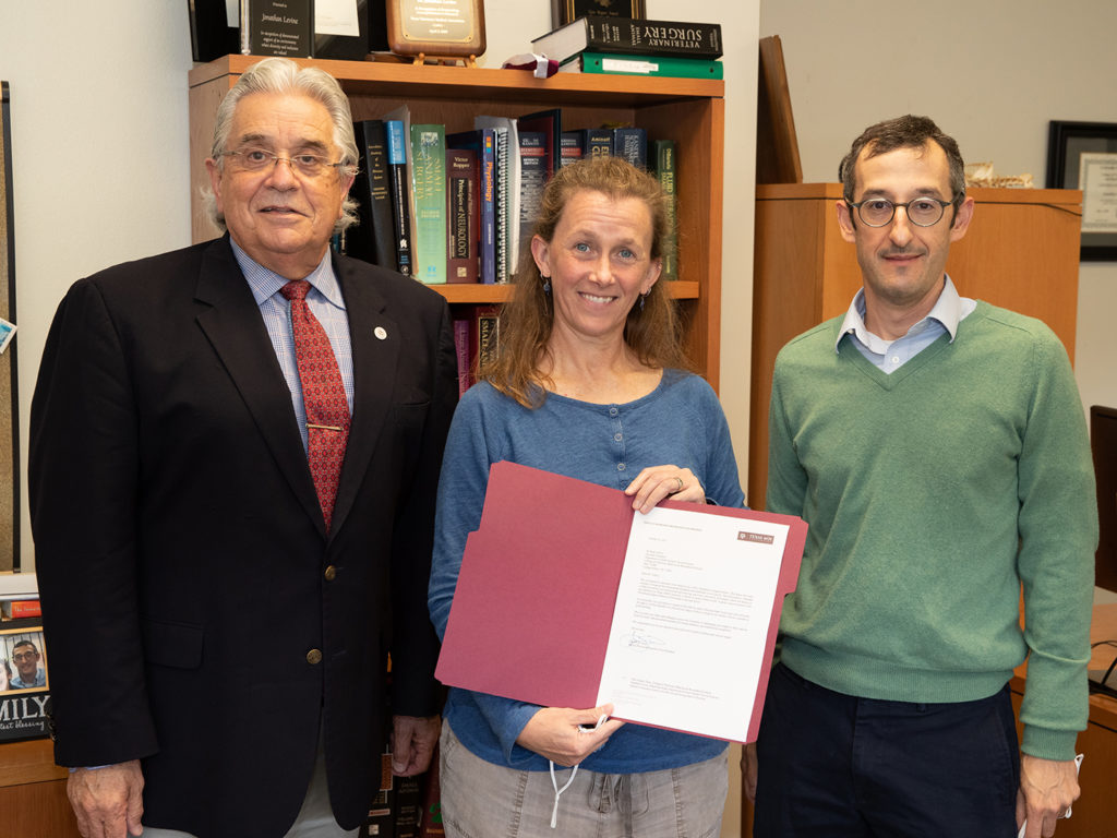 August, Creevy holding her selection letter, and levine