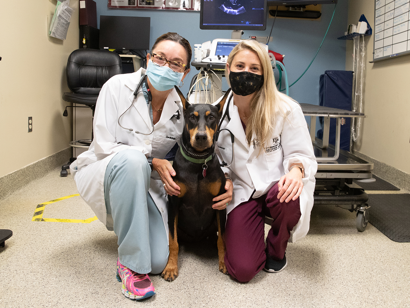 Gordon and Malcolm with a Doberman