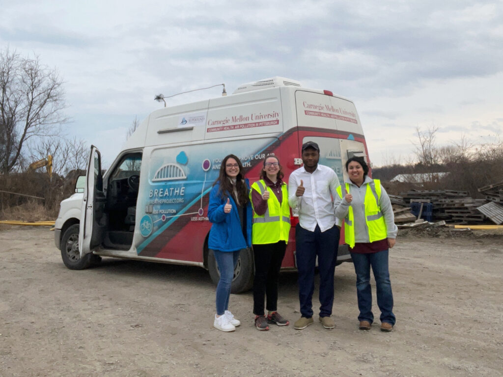 Superfund and Carnegie Mellon researchers in front of the mobile testing lab