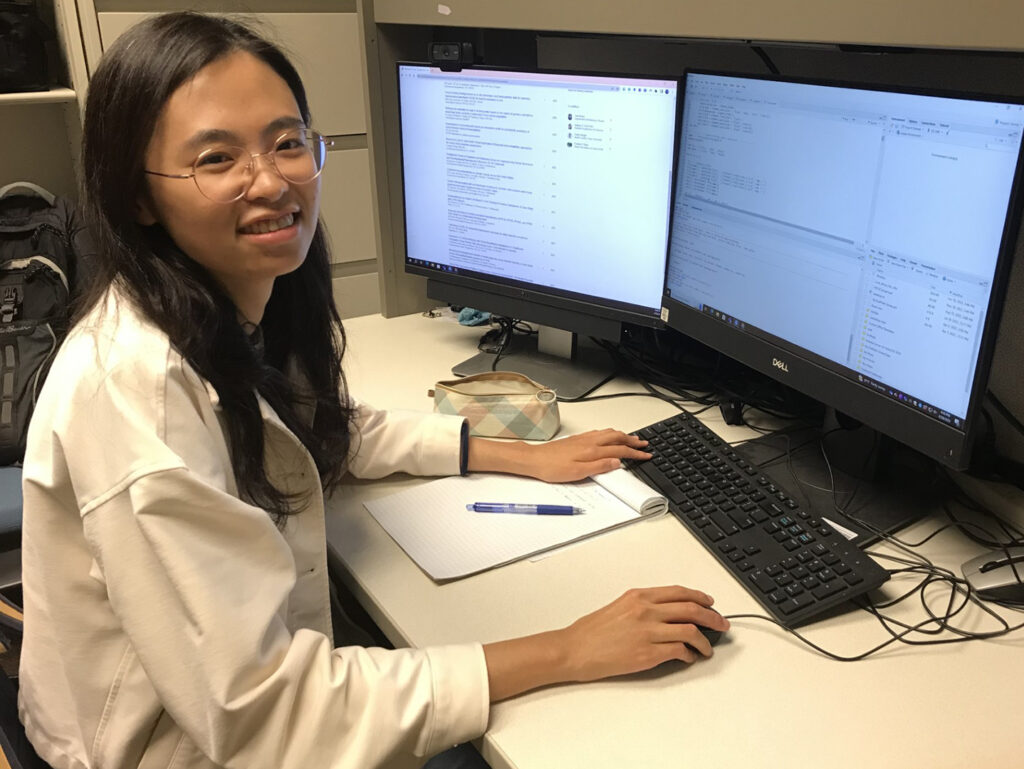 Trainee Hsing-Chieh Lin working at a computer