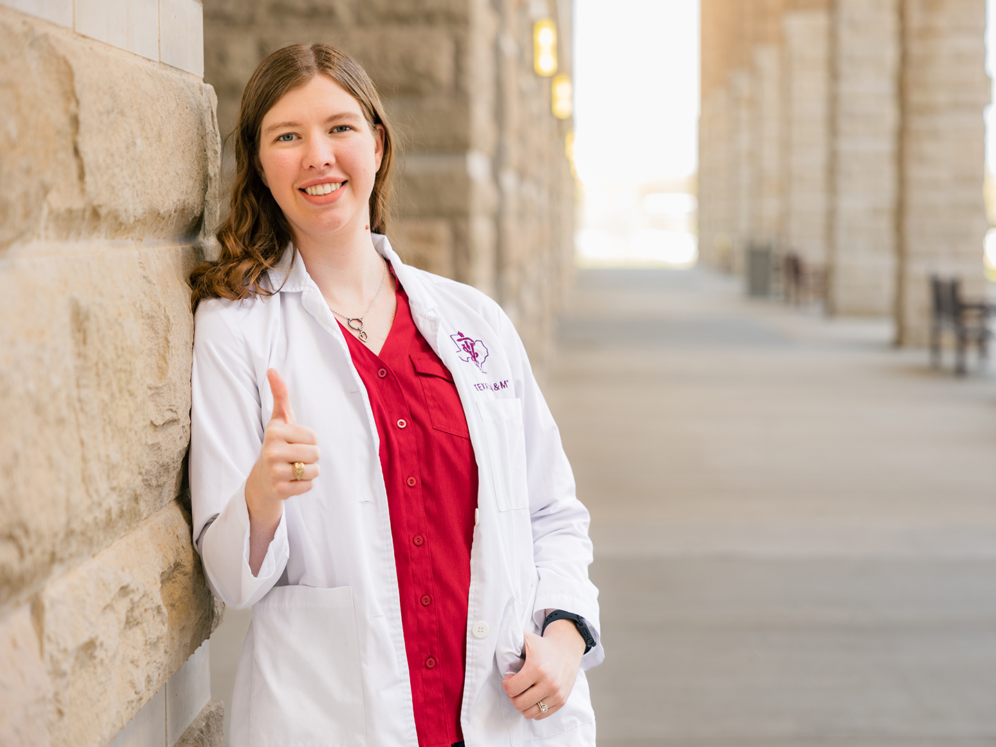 Guenther in her white coat doing gig 'em