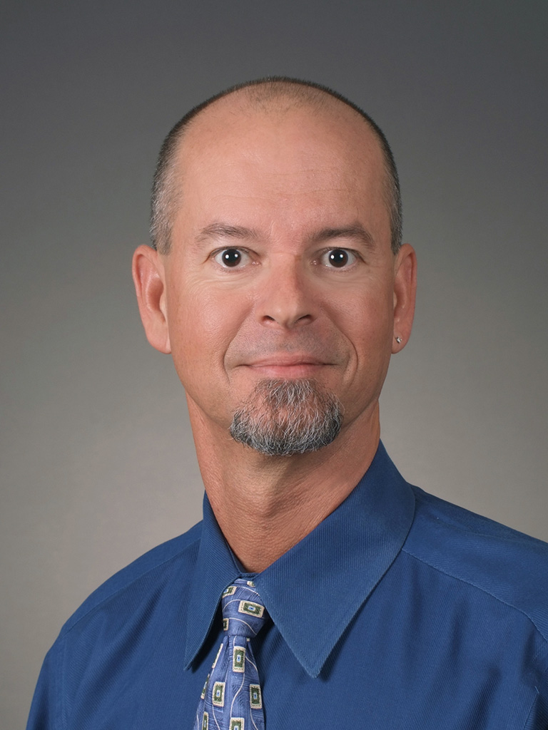 University headshot of Dr. Anton Hoffman.