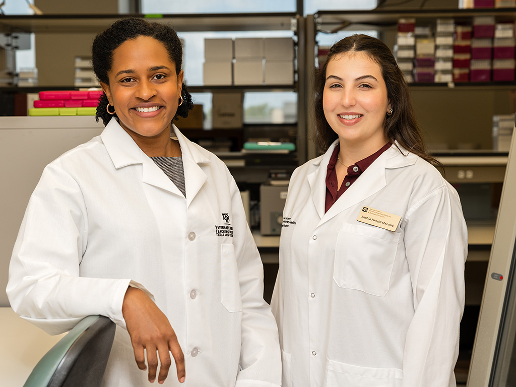 Two women in lab coats.