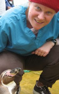 Dr. Jill Heatley with a penguin