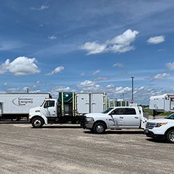 Veterinary Emergency Team trucks lined up on deployment