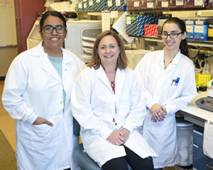 researchers posing in the lab