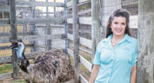 an emu with Dr. Alice Blue-McLendon